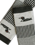 Pair of socks with crocodile design and patterned finish on a white background