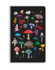 Notebook with colorful mushroom illustrations on a black background