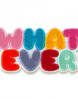Colorful patch with the word 'WHATEVER' on a white background