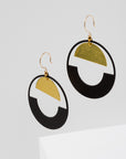 Larissa Loden Jewelry, Handmade in MN. Baltic Earrings, Large rubberized brass circle with brass half-moon component. Earrings are approx. 3 inches long. Gold filled ear wires.