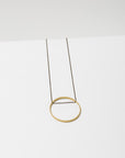 Larissa Loden Jewelry, Handmade in MN. Horizon Necklace, Geometric brass shapes threaded with delicate antiqued chain. Necklace 18 inches long with clasp.