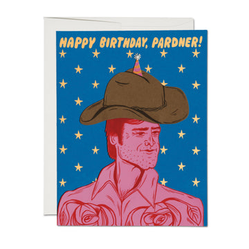 Birthday card with a cowboy illustration and 'Happy Birthday, Pardner!' text on a blue background with stars.