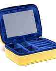 Jewelry box with blue interior and yellow exterior on a white background