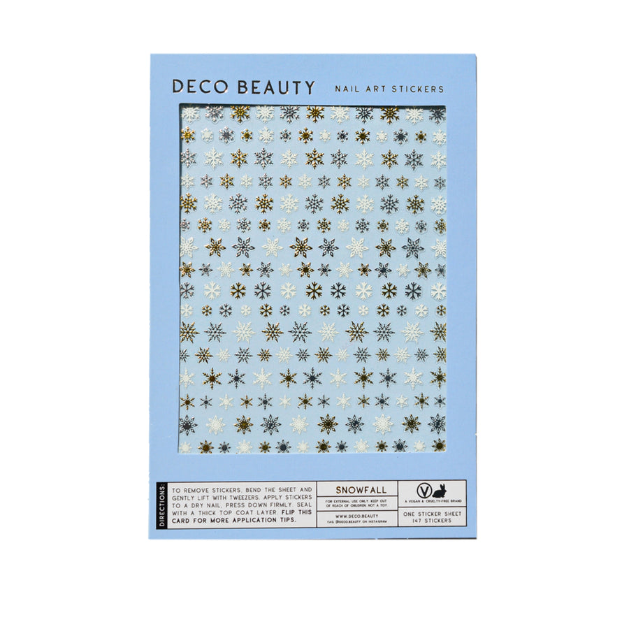 Packaging of Deco Beauty nail art stickers with snowflake designs on a blue background