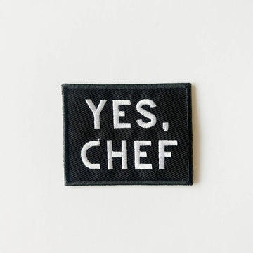 Black patch with 'YES, CHEF' text on a white background