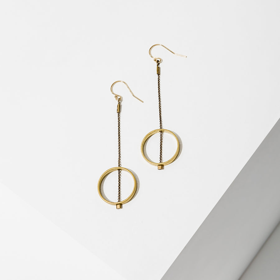 Larissa Loden Jewelry, handcrafted in MN. Horizon Earrings, Brass shape threaded with delicate antiqued chain. Earrings are approx. 2 inches long. Gold filled ear wires.