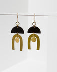 Larissa Loden Jewelry, Handmade in MN. Tulum Earrings, Rubberized half-moon shapes with brass components. Earrings are approx. 3 inches long. Gold filled ear wires.
