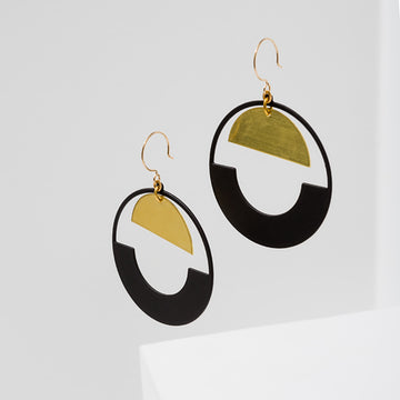 Larissa Loden Jewelry, Handmade in MN. Baltic Earrings, Large rubberized brass circle with brass half-moon component. Earrings are approx. 3 inches long. Gold filled ear wires.