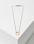 Larissa Loden Jewelry, Handmade in MN. Horizon Necklace, Geometric brass shapes threaded with delicate antiqued chain. Necklace 18 inches long with clasp.