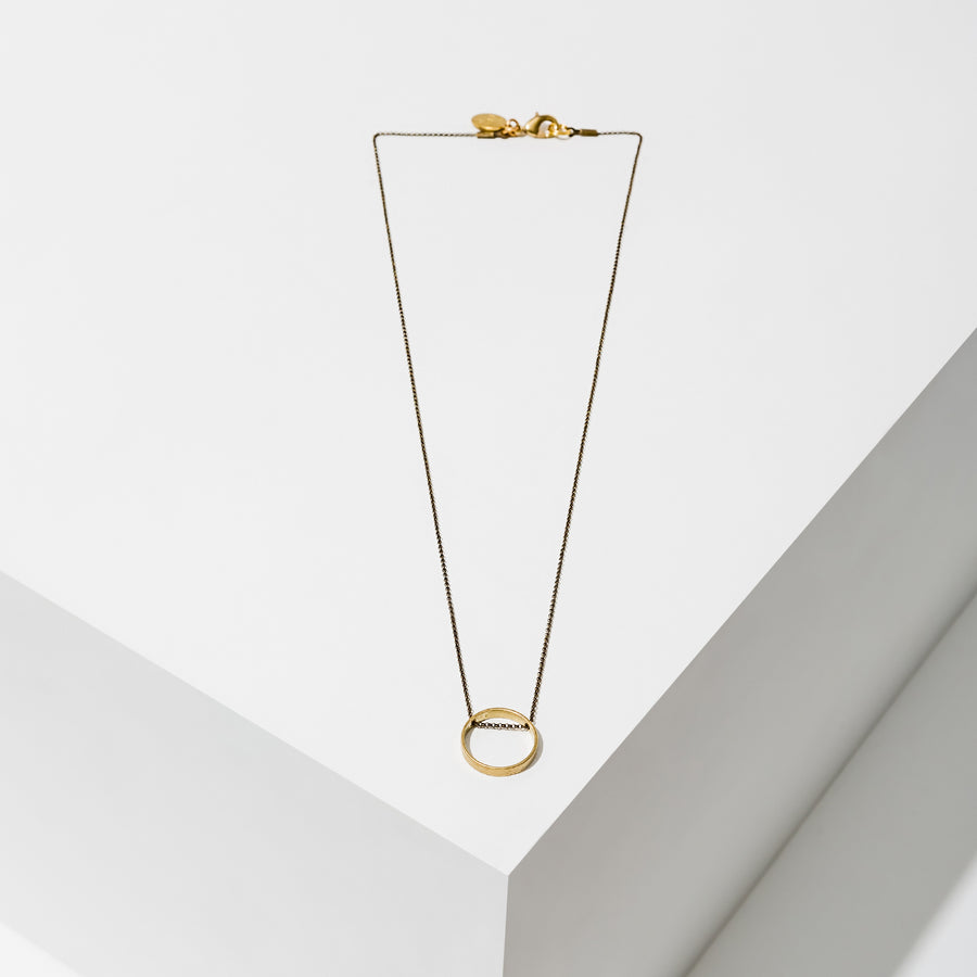 Larissa Loden Jewelry, Handmade in MN. Horizon Necklace, Geometric brass shapes threaded with delicate antiqued chain. Necklace 18 inches long with clasp.