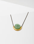 Larissa Loden Jewelry, Handcrafted in MN. Sun and Moon Necklace, Rough cut gemstone paired with brass or silver tube hangs from matching chain. Necklace 18 inches long with clasp.